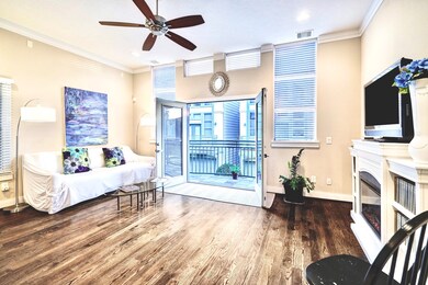 French doors open up to the balcony, exuding lot o
