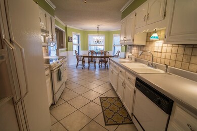 Another view of this inviting kitchen with 16x16 t