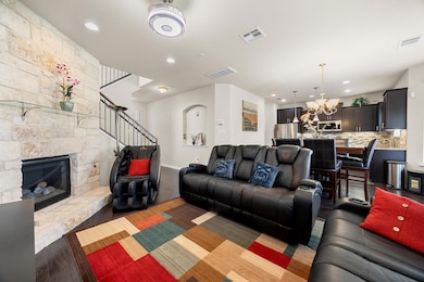 Inside, enjoy a beautiful contemporary open floor plan connecting the living room, kitchen, and dining area.