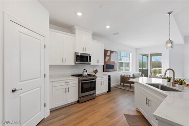 16889 Fairgrove Way unit 5-201, Naples, FL 34110 - photo 6