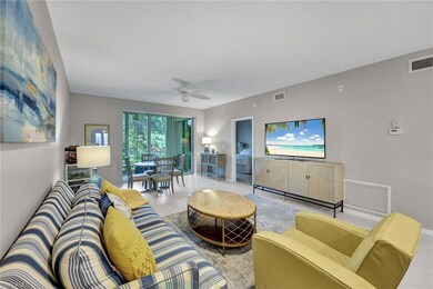Living room featuring ceiling fan