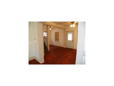 Living Room. Newly finished hardwood floors and fr