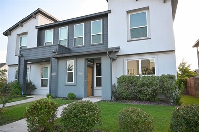 View of front facade with stucco siding