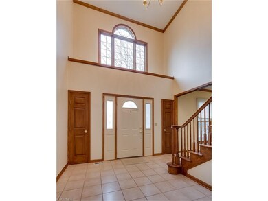 Welcome! This 2-story foyer has tiled flooring, do