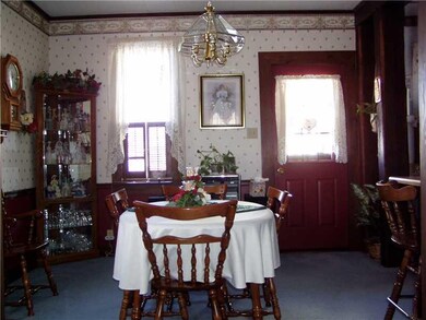 Dining Room. Other view of dining room with door t
