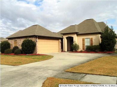 Two car garage with heated and cooled storage room