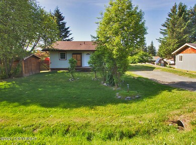 Pretty front yard with a shed