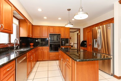 Kitchen with Granite Island & Counters