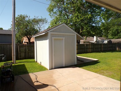 Nice storage building for your grill or yard equip