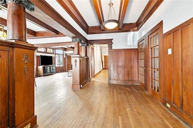 Foyer, pretty original woodwork.