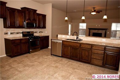 Spacious eat in kitchen looking into family room