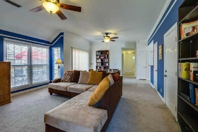 Cozy living area opens to patio
