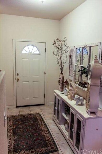 Tiled entry, to Living Room and Hallway, Family Ro