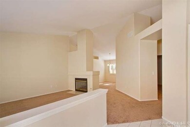 foyer to living and dining rooms, den