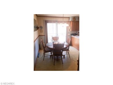 Dine-in Kitchen with sliding glass doors to deck
