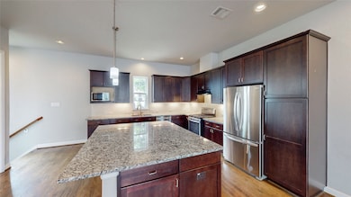This beautiful kitchen offers a stylish and functi