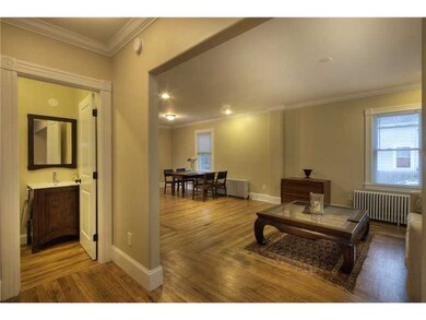 Entry. Rich oak floors warmly greet you into the s
