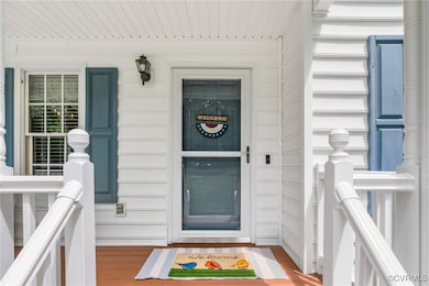 Property entrance featuring a porch
