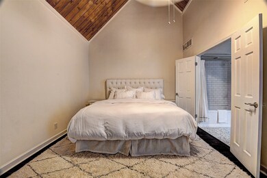 Large Master Bedroom with Wood Plank vaulted ceili