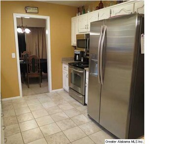 Updated kitchen with stainless appliances, pantry,