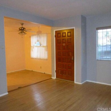 Entry, dining room, and living room.