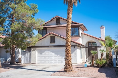 Mediterranean / spanish-style home featuring stucco siding, a tiled roof, concrete driveway, and a chimney