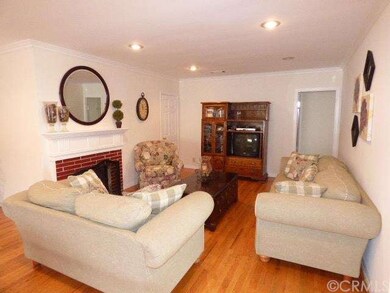 OPEN SPACIOUS LIVING ROOM WITH FIREPLACE