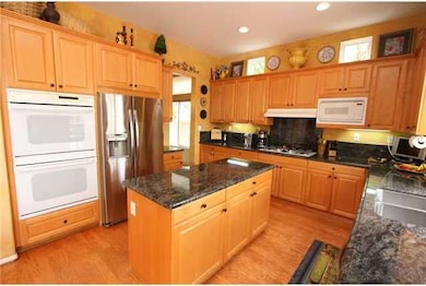 Work island, granite counter tops, built-in fridge