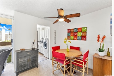 The living room flows seamlessly into the dining a