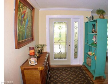 Entry to 504 Whitewater Way - Notice the New Impact Resistance Entry door and new laminate floors.