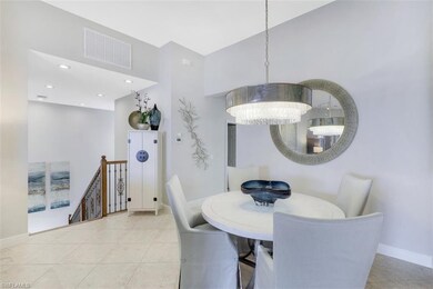 Formal Dining Area overlooking wood/iron entry sta