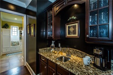Lovely butlers pantry leading into dining room.
