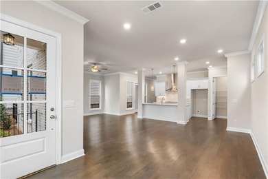 As you step into the front entry, you immediately see the open floorplan where dining, family and kitchen flow seamlessly.