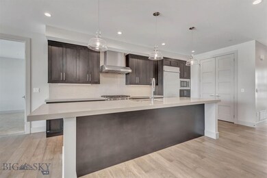 Actual unit with chef's kitchen and commercial gra