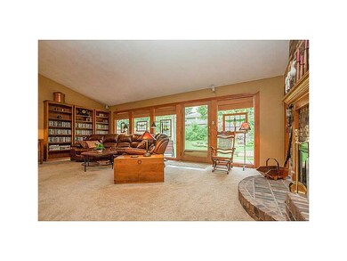 Great Room. Floor to ceiling windows overlooking b