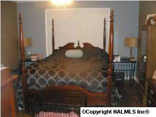 MASTER BEDROOM HAS LAMINATE WOOD FLOORING,LARGE BATH AND HUGH CLOSET WITH PULL DOWN STAIRS TO ATTIC FOR EXTRA STORING.