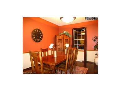 Formal dining room w/hardwood flooring