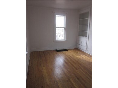 Dining Room. hardwood floors, built ins