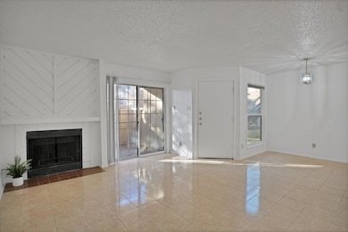 Unfurnished living room featuring a notable chande