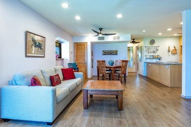 The dining area & chef's kitchen blend together seamlessly.