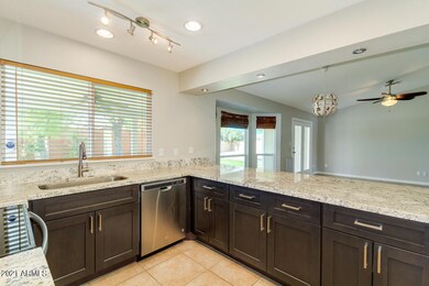 Open Concept Kitchen Overlooks the Pool!