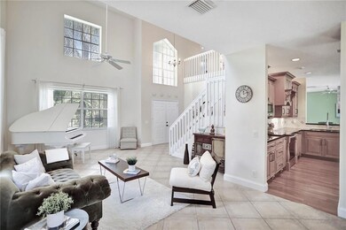 Soaring ceilings in foyer and living area.