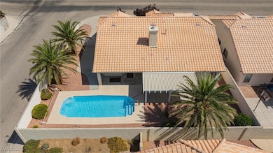 Aerial view of property and surrounding area with