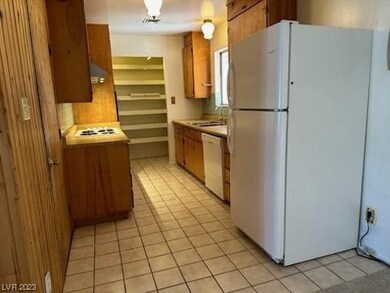 WALK IN PANTRY AT END OF KITCHEN