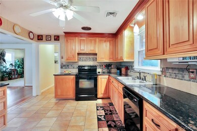 Kitchen with Tile Flooring, Granite Countertops, S