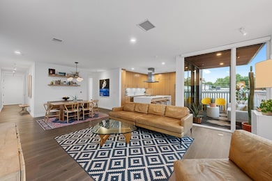 Living room featuring recessed lighting and dark 