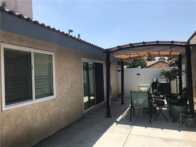 Patio off sliding glass door in living room.