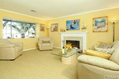 Generously proportioned formal living room opens t