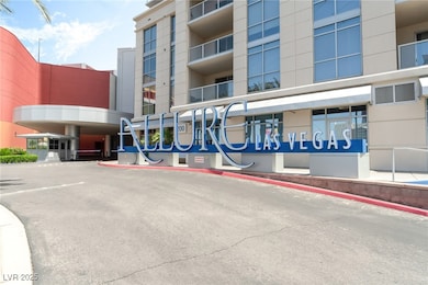 View of apartment building / complex with uncovere