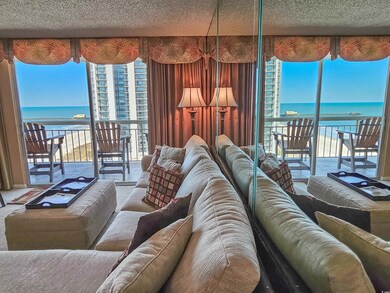 Carpeted living room featuring a textured ceiling,